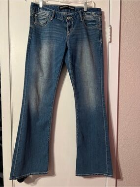 Express Boot Stella Low Rise Jeans in Medium Blue Wash